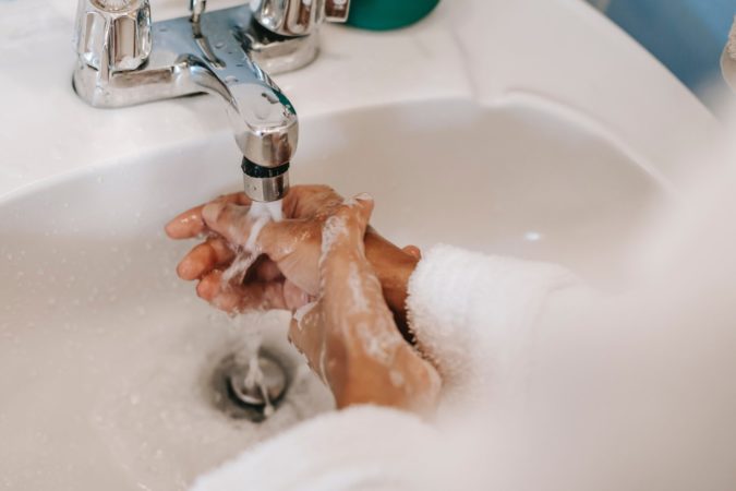pexels-sora-shimazaki-5938604 Person washing hands