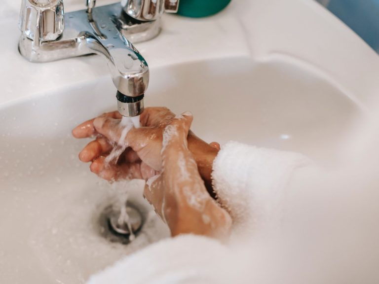 Person washing hands