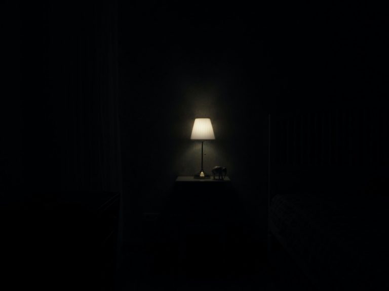 dim lamp in a dark room