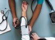 A doctor taking a patient's blood pressure